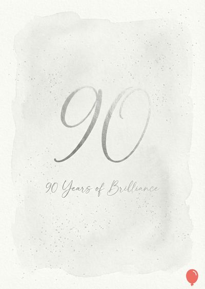 A light gray watercolor design with the number «90» in a silver script. Beneath it is written «90 Years of Brilliance». A small red balloon rests in the bottom right corner.